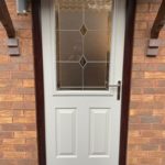 Composite Endurance "Snowdon" door in pearlgrey and rosewood frame with "fabian" glass